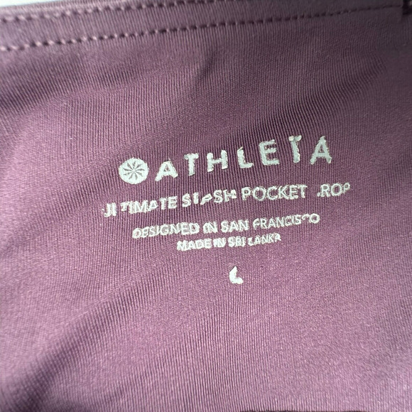 ATHLETA | Large Ultimate Stash Pocket Crop Compression High Rise Purple Leggings - Picture 7 of 9